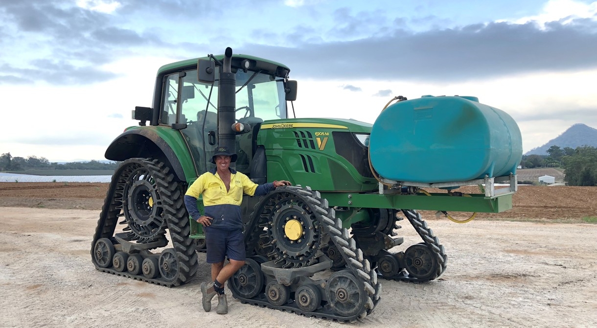 Jason Dipple with the 6105M tractor at Pinata Farms, Wamuran, Sunshine Coast
