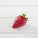 A single fresh Pinata strawberry