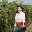 Sales and marketing manager Rebecca Scurr in the specialty raspberry crop at Wamuran, Queensland