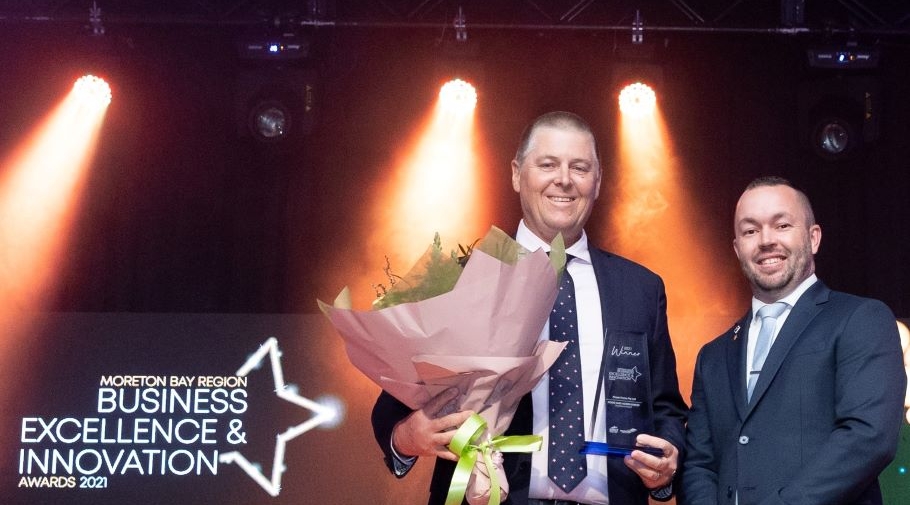 Managing director Gavin Scurr receives the Food and Agribusiness Award from Councillor Tony Latter of Moreton Bay Regional Council.